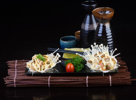 japanese cuisine. grilled shell fish on background