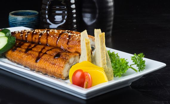 japanese cuisine. unagi or eel on background