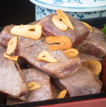 japanese cuisine. beef cube on background