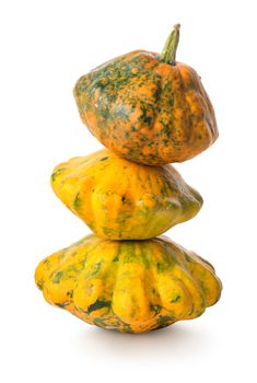 Pyramid of gourds isolated on a white background