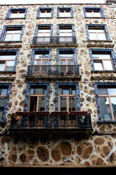 House facade with balconies and fantasy patterns