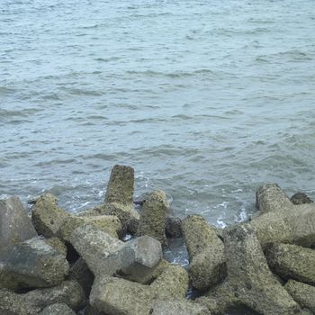 Concrete star shaped blocks on the side of the ocean