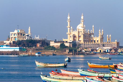 fishing harbour with mosque in the background (Arabian Sea, Kerala, India)