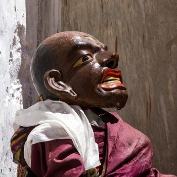 KARSHA, INDIA - JUL 17: unidentified monk performs a religious mask dance during the Cham Dance Festival on Jul 17, 2012 in Karsha, India.