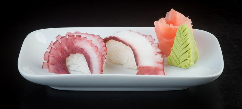 japanese cuisine. sushi octopus on background