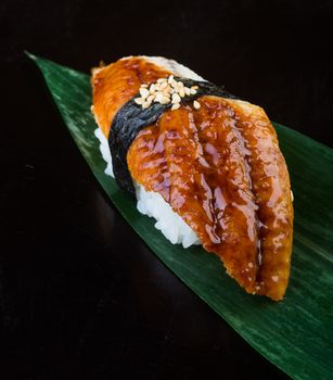 japanese cuisine. sushi unagi on background