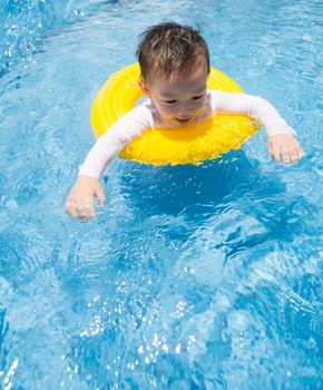 baby boy Activities on the pool, asian children swimming