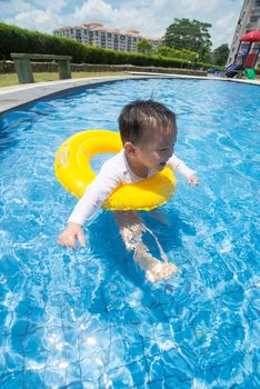 baby boy Activities on the pool, asian children swimming