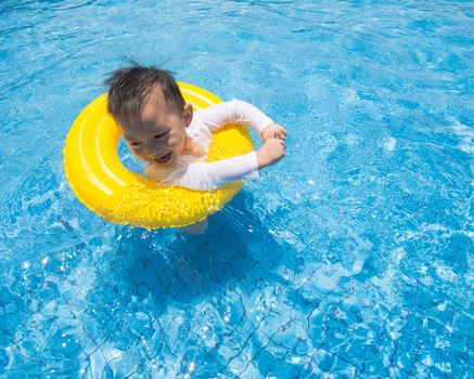 baby boy Activities on the pool, asian children swimming