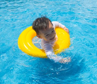 baby boy Activities on the pool, asian children swimming