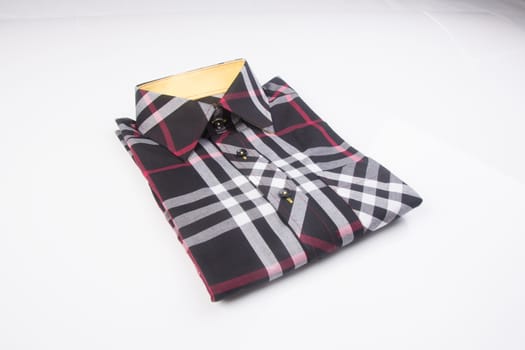 shirt. mens shirt folded on background