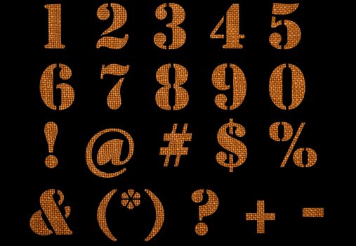 Material textured numbers, signs and symbols isolated on black background.