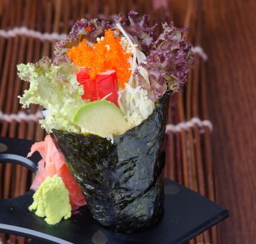 japanese cuisine. hand roll on background