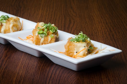 japanese cuisine. fried tofu on background