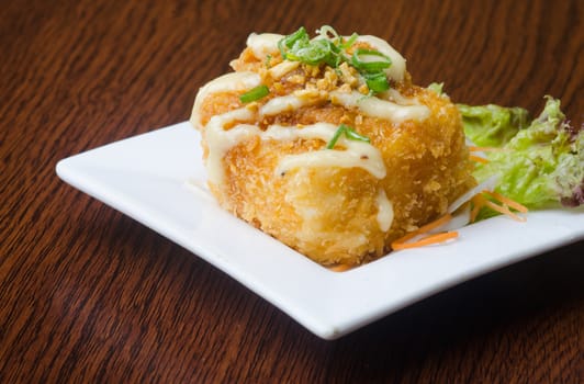 japanese cuisine. fried tofu on background