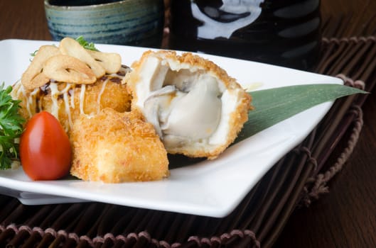 japanese cuisine. fried tofu on background