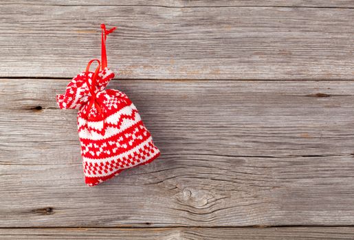 Christmas decoration with xmas canes, over wooden background