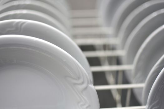 Dishes ready to go in a dishwasher.