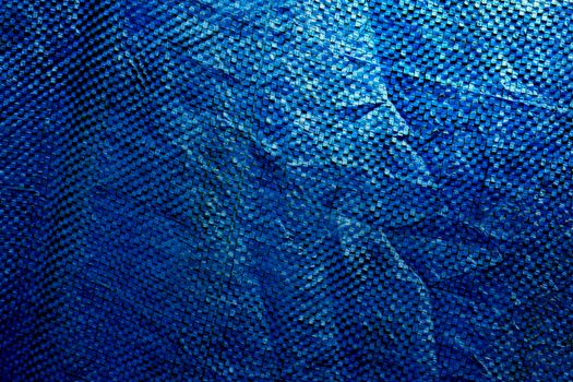 Blue plastic cloth texture, suitable for a background