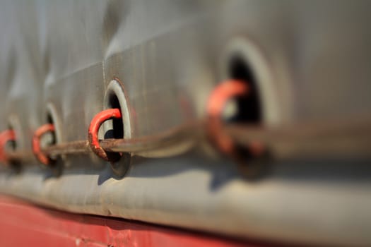 Shallow depth of field, side view of a trailer.