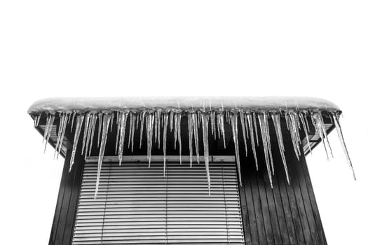 Dangerous incicles hanging on a roof