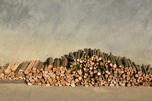 Side view of a tiny wood stack, cropped image