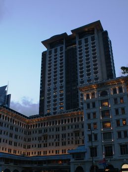 Buildings in twilight in Hong Kong, Asia, with lighting windows