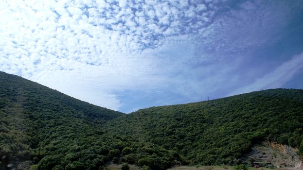 Beautiful high mountains with blue sky and clouds