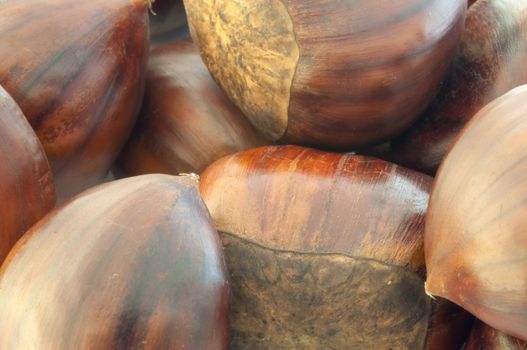 raw natural macro of chestnuts in studio