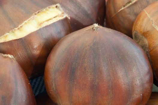 raw natural macro of cooked chestnuts in studio