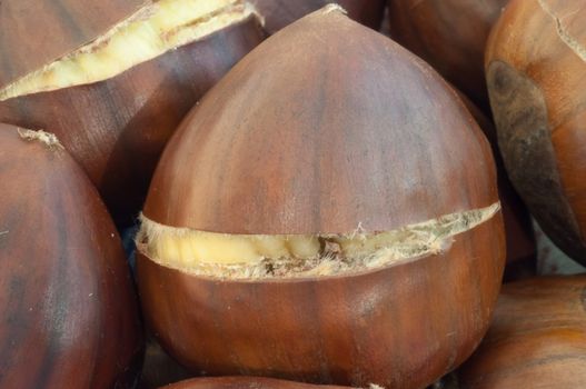 raw natural macro of cooked chestnuts in studio