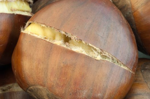 raw natural macro of cooked chestnuts in studio