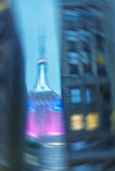 Blurred night scene of New York skyline.