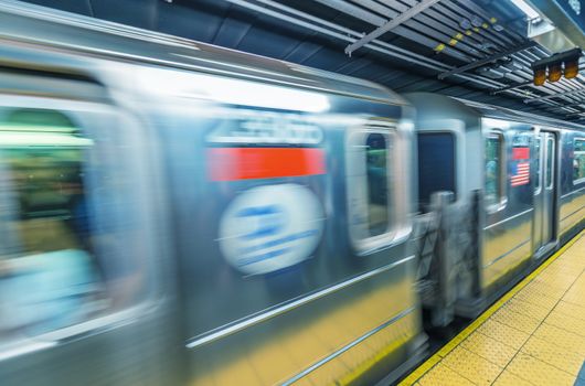 Fast moving train in Manhattan subway - New York transportation concept.