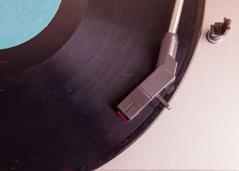 Turntable seen from above, record with blue label
