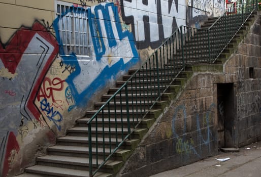 The stairs wall with a colorful decoration.