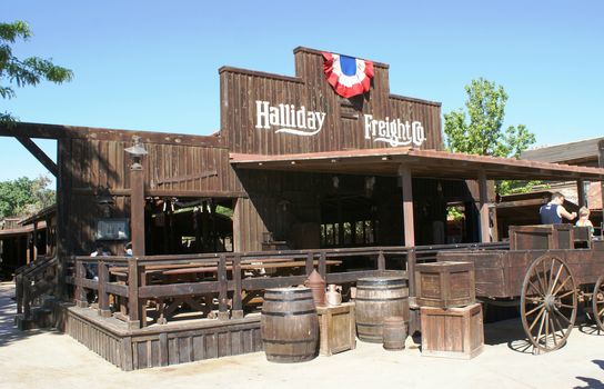 Wild West style house, wooden building in park