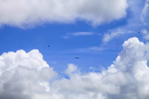 Fantastic soft white clouds against blue sky