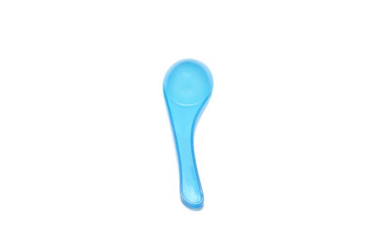 blue plastic spoon on a white background