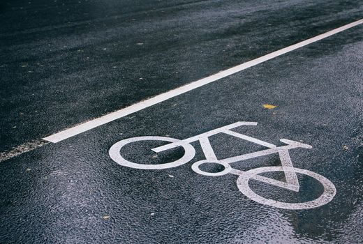 Bicycle sign on the road after the rain,Beijing