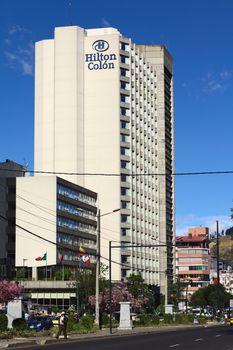 QUITO, ECUADOR - AUGUST 8, 2014: The hotel Hilton Colon on Patria Avenue at the El Ejido Park on August 8, 2014 in Quito, Ecuador