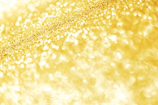 Abstract glitter bokeh holiday golden background