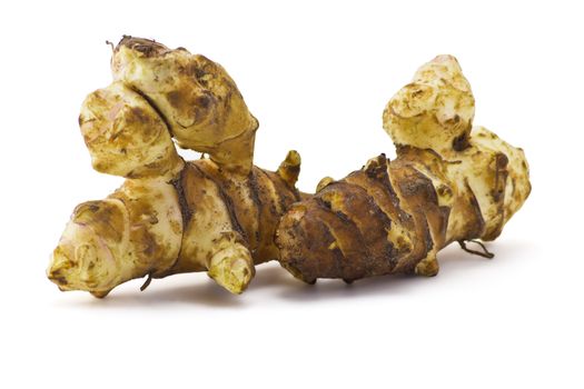 The root of Jerusalem artichoke on a white background