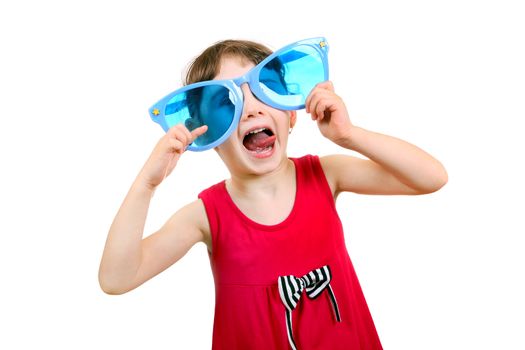Cheerful Little Girl with Big Blue Glasses Isolated on the White Background