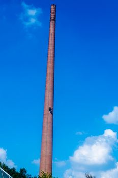 Big Chimney, fireplace brick against a blue sky.