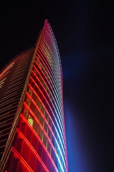 fragment of illuminated buildings, the aspirant into the night sky