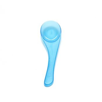 blue plastic spoon on a white background