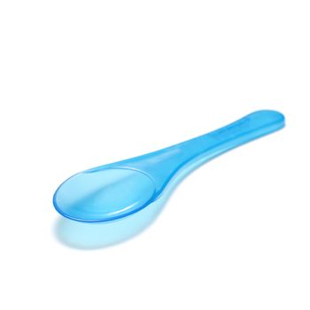 blue plastic spoon on a white background