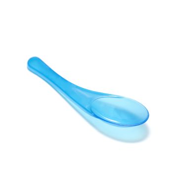 blue plastic spoon on a white background