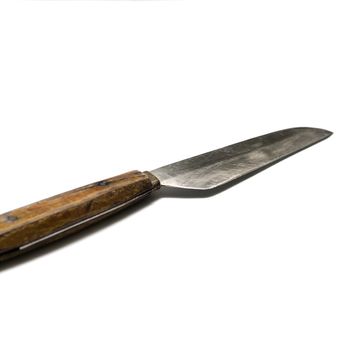 old used knife on a white background